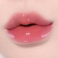NATURE REPUBLIC Honey Melting Lip balm in a 2.7g container, offering nourishing hydration for soft, smooth lips.