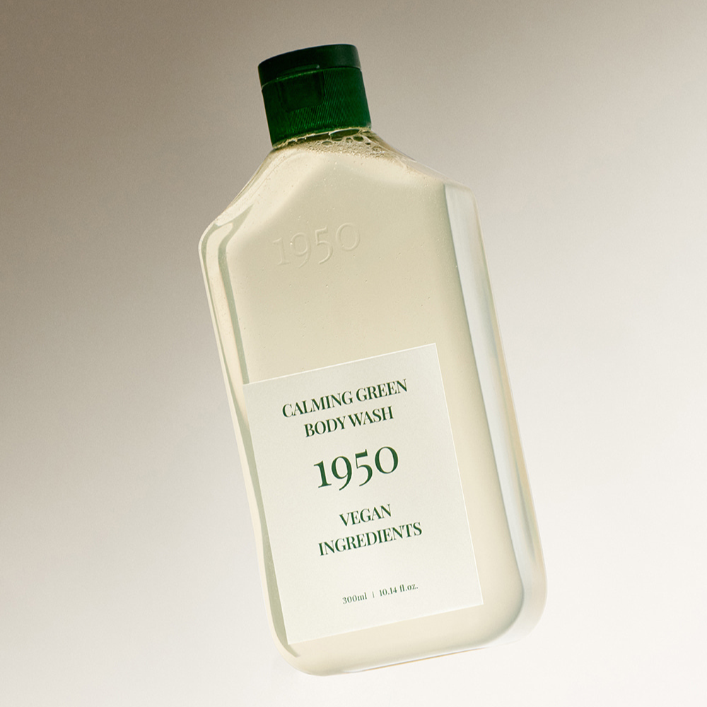 A duo set of 1950 Jeju Body Wash and Scrub, designed for a soothing cleanse with natural elements and stylish presentation.