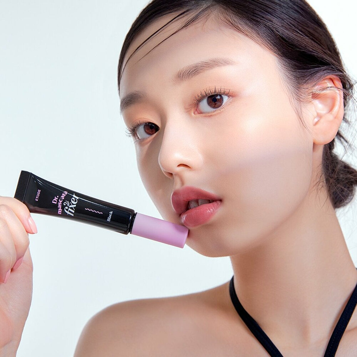 Etude House Dr. Mascara Fixer, 13g, available in two formulations, enhances mascara performance for long-lasting, curled lashes.