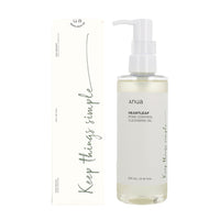 Anua Heartleaf Pore Control Cleansing Oil 200ml bottle on white background.