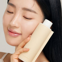 Slosophy Newtinol Toner in a 150ml bottle, crafted for enhancing skin texture, showcased in a stylish and minimalist container.
