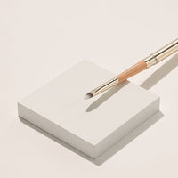 It features a retractable design that keeps the brush head protected and clean when not in use. 