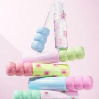 Colorgram's Fruity Glass Tint 2.8g, featuring a colorful tube designed to enhance your lips with fruity shades.